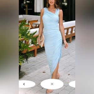 This is a dress from VICI, never worn. Light blue, fitted size large.